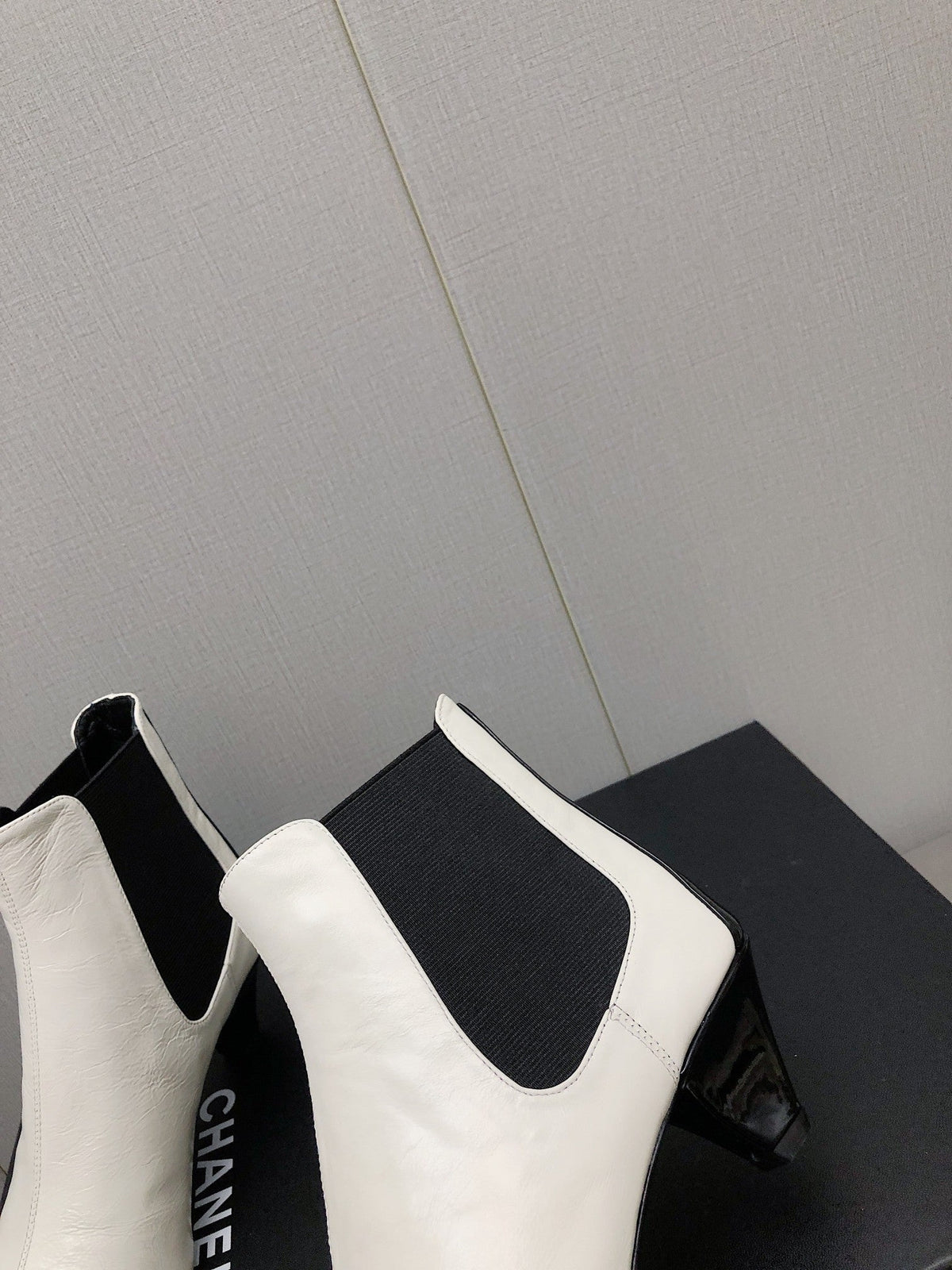 CHANEL SHORT BOOTS IN WHITE MIX BLACK SHEEPSKIN