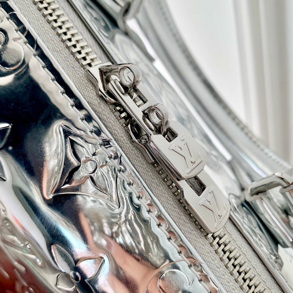 LOUIS VUITTON SPEEDY BANDOULIÈRE 20 IN SILVER MONOGRAM EMBOSSED CALFSKIN