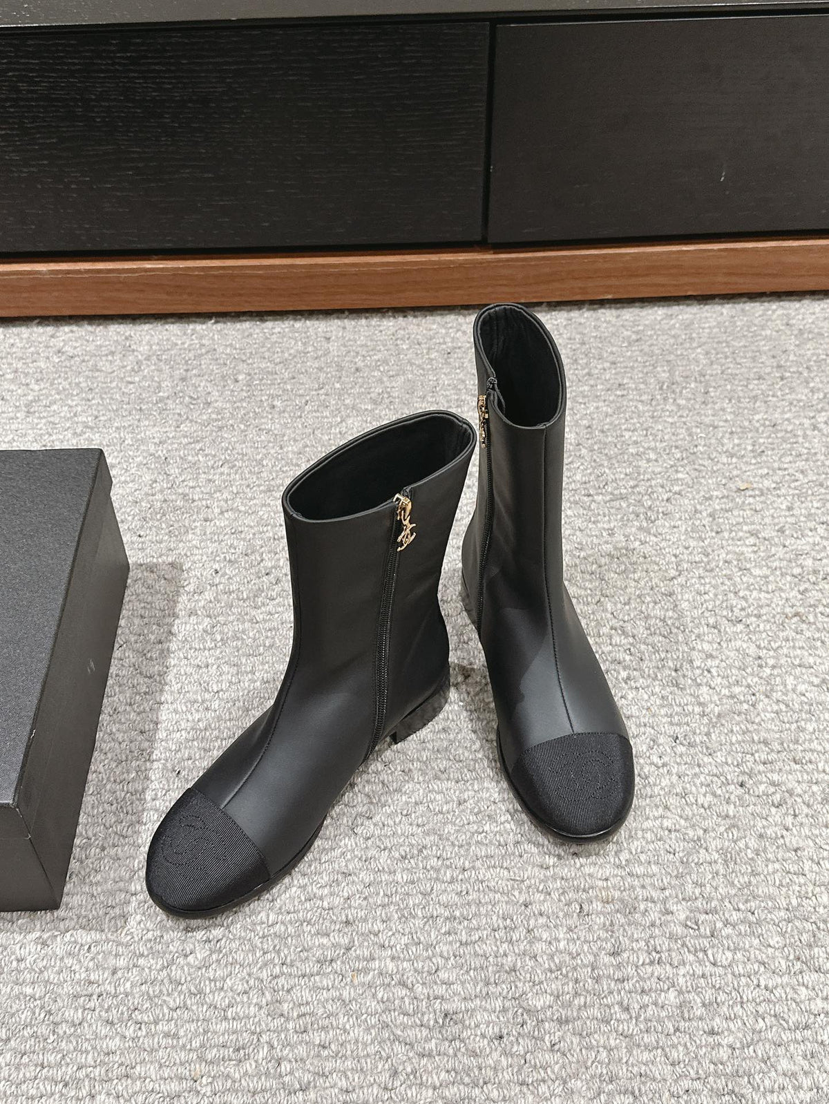 CHANEL SHORT BOOTS IN BLACK LAMBSKIN AND FABRIC